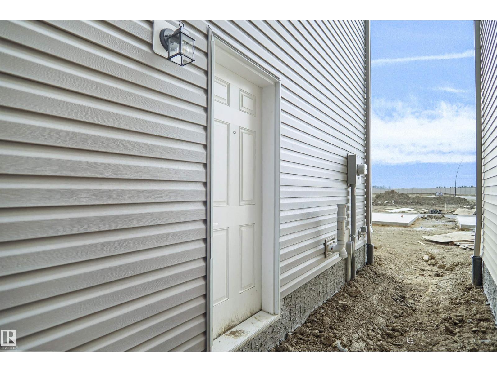 21223 25 AV NW - 27