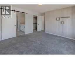 Family room - 112 Emberside Place, Cochrane, AB T4C3A8 Photo 11