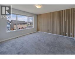 Bedroom - 112 Emberside Place, Cochrane, AB T4C3A8 Photo 10