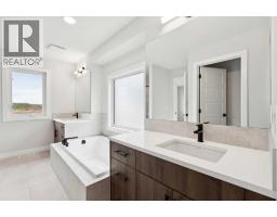 102 Bridgeport Landing, Chestermere, AB T1X3E3 Photo 23