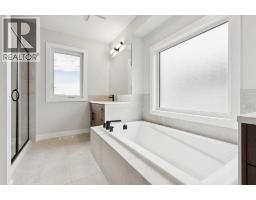 102 Bridgeport Landing, Chestermere, AB T1X3E3 Photo 24