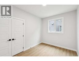 Bedroom - 102 Bridgeport Landing, Chestermere, AB T1X3E3 Photo 7