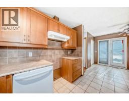 Family room - 243 Erin Meadow Close, Calgary, AB T2B3E6 Photo 9