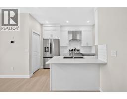Family room - 2274 Bayview Drive Sw, Airdrie, AB T4B5N6 Photo 10