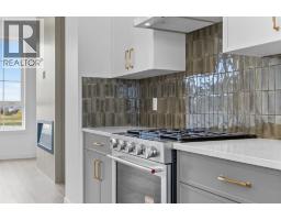 Laundry room - 112 Greenwich Drive Nw, Calgary, AB T3B6N8 Photo 13