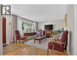 Living room - 4539 26 Avenue Sw, Calgary, AB T3E0P8 Photo 6