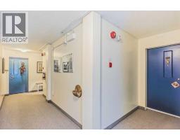 Bedroom - 202, 520 Cedar Crescent Sw, Calgary, AB T3C2Y8 Photo 10