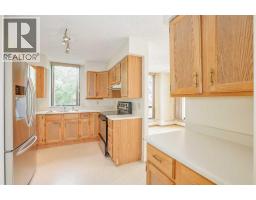 208, 80 Point Mckay Crescent Nw, Calgary, AB T3B4W4 Photo 11