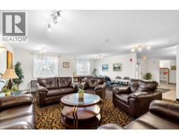 2102, 928 Arbour Lake Road NW - photo 13