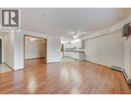 Kitchen - 220, 7229 Sierra Morena Boulevard Sw, Calgary, AB T3H3L8 Photo 8