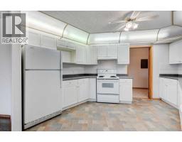 220, 7229 Sierra Morena Boulevard Sw, Calgary, AB T3H3L8 Photo 12