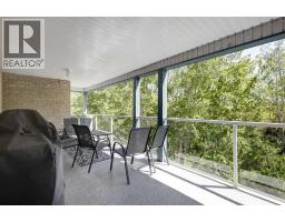 220, 7229 Sierra Morena Boulevard Sw, Calgary, AB T3H3L8 Photo 41