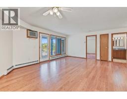 Laundry room - 220, 7229 Sierra Morena Boulevard Sw, Calgary, AB T3H3L8 Photo 10