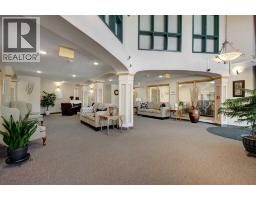 220, 7229 Sierra Morena Boulevard Sw, Calgary, AB T3H3L8 Photo 37