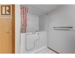 220, 7229 Sierra Morena Boulevard Sw, Calgary, AB T3H3L8 Photo 24