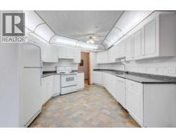 220, 7229 Sierra Morena Boulevard Sw, Calgary, AB T3H3L8 Photo 13
