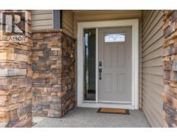 Living room - 6555 Blackcomb Place, Vernon, BC  Photo 6