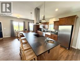 Family room - 77, 210044 Highway 512, Rural Lethbridge County, AB T1J5N9 Photo 13
