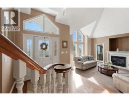 Living room - 32, 28364 Township Road 384, Rural Red Deer County, AB T4S2B5 Photo 7