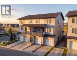 203, 315 Redstone Walk NE - photo 2