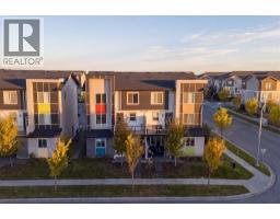 203, 315 Redstone Walk NE - photo 1