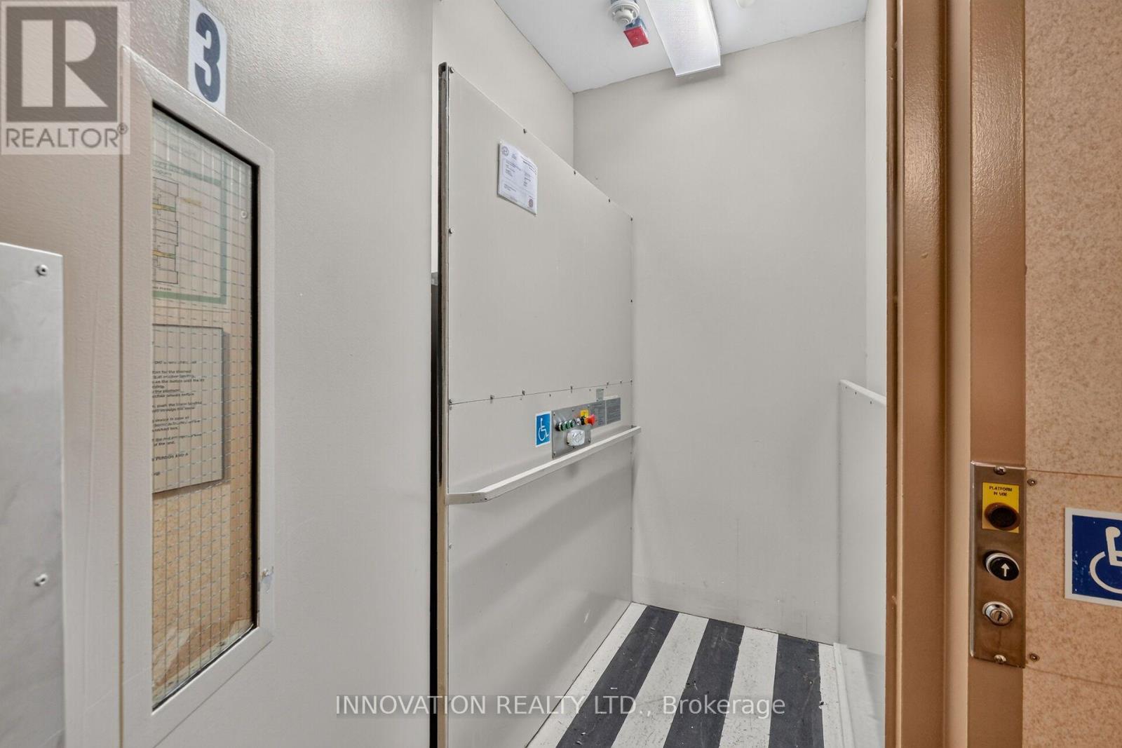 Lift outside suite works parking garage upward
