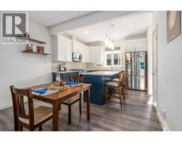 Primary Bedroom - 211 Wolf Creek Avenue Se, Calgary, AB T2X4X1 Photo 9