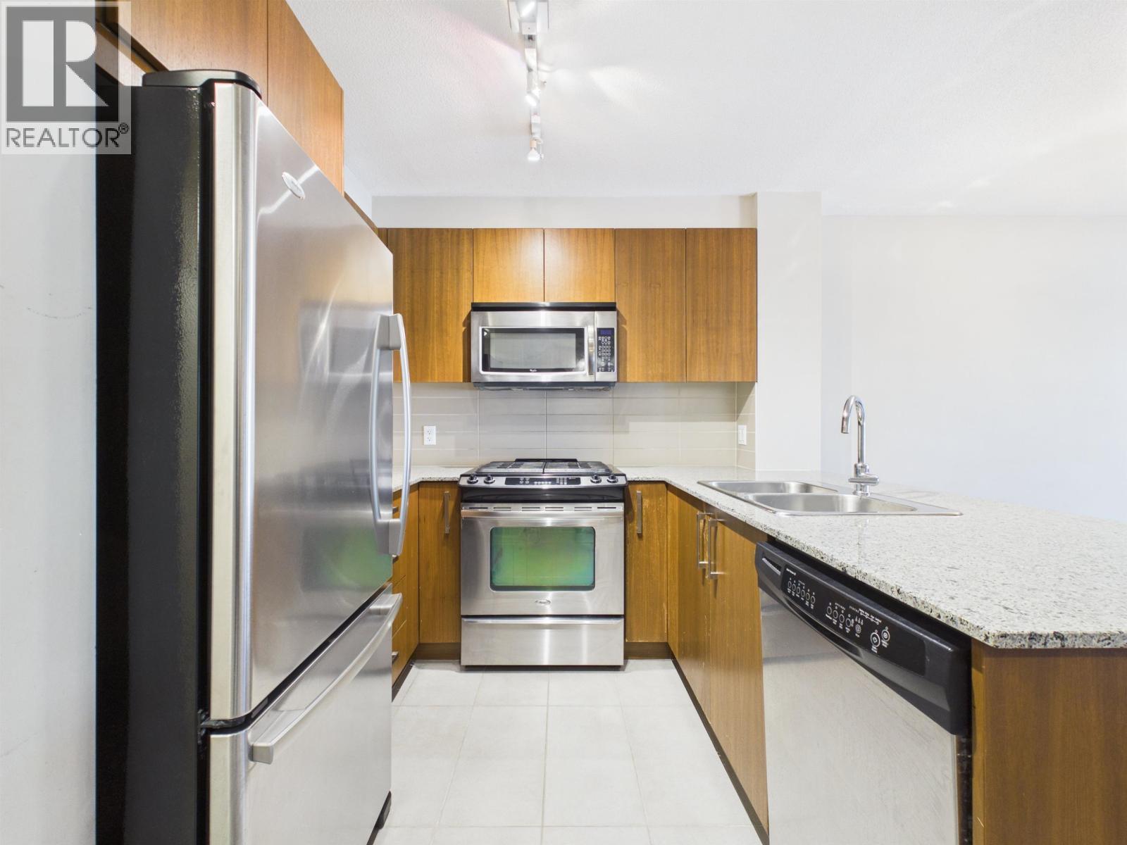Photo of 215 5889 IRMIN STREET 13