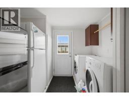 Living room - 117 Elm Street, Fort Mcmurray, AB T9K0G8 Photo 9