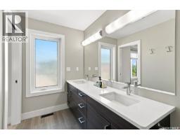 703 Meadows Boulevard, Saskatoon, SK S7V0L3 Photo 24