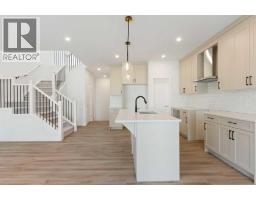 83 Heritage Manor, Cochrane, AB T4C3K8 Photo 16