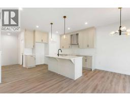 83 Heritage Manor, Cochrane, AB T4C3K8 Photo 14