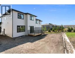 83 Heritage Manor, Cochrane, AB T4C3K8 Photo 49