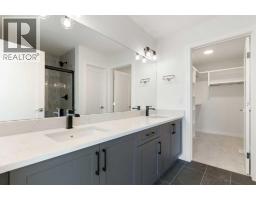 83 Heritage Manor, Cochrane, AB T4C3K8 Photo 36