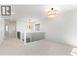 83 Heritage Manor, Cochrane, AB T4C3K8 Photo 31