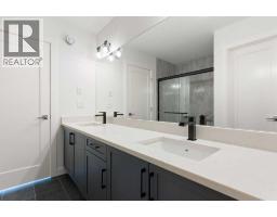 83 Heritage Manor, Cochrane, AB T4C3K8 Photo 38