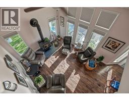 Family room - 94038b -- 702 Township, Rural Grande Prairie No  1, County Of, AB T0H3S0 Photo 19
