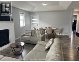 Family room/Fireplace - 11506 Palmetto, Windsor, ON N8N0A2 Photo 7
