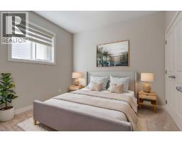 Bedroom - 54 Creekstone Square Sw, Calgary, AB T2X4P6 Photo 16