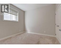 Bedroom - 54 Creekstone Square Sw, Calgary, AB T2X4P6 Photo 17