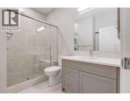 Den - 54 Creekstone Square Sw, Calgary, AB T2X4P6 Photo 18