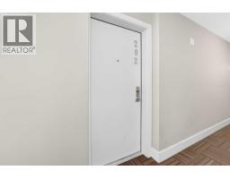 Bedroom - 202, 10 Auburn Bay Link Se, Calgary, AB T3M1Y8 Photo 6