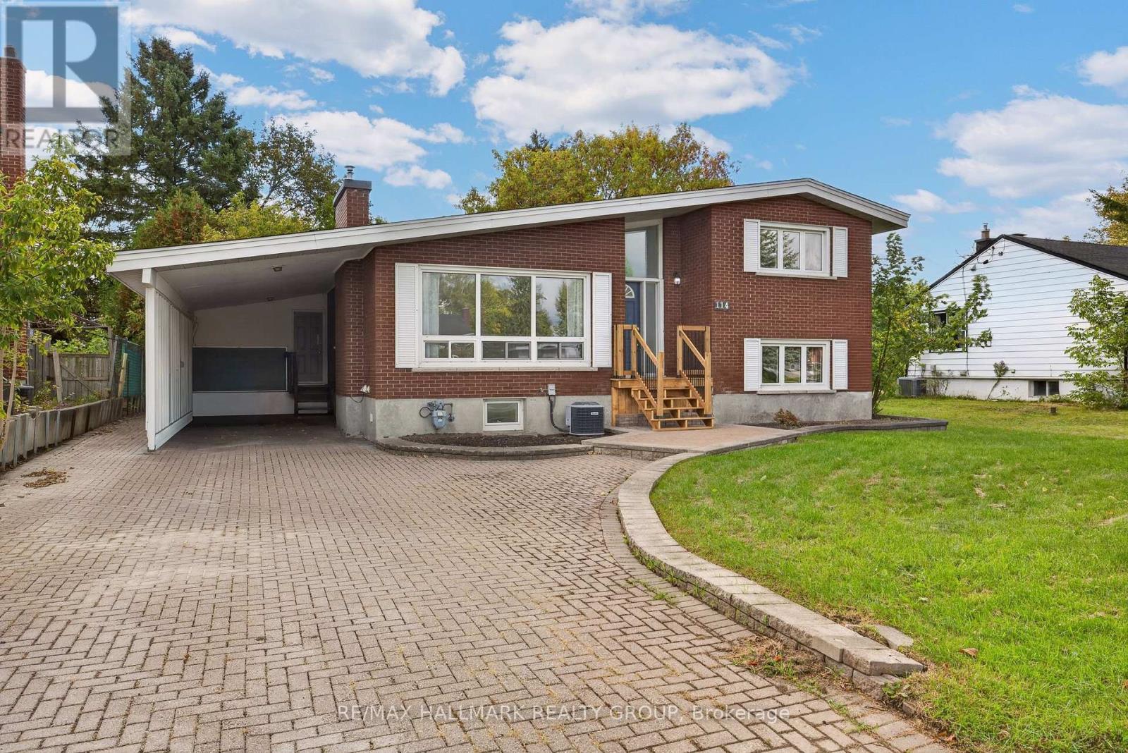Spacious carport with inside entry