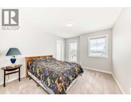 Bedroom - 151 Sundown Way, Cochrane, AB T4C0H4 Photo 24