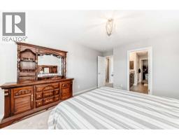 Bedroom - 151 Sundown Way, Cochrane, AB T4C0H4 Photo 18