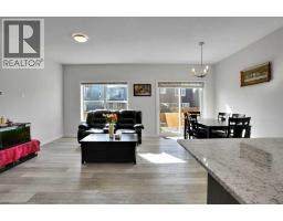 Family room - 235 Clydesdale Avenue, Cochrane, AB T4C2R1 Photo 11