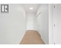 2310, 42 Cranbrook Gardens SE - photo 2