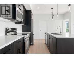 2310, 42 Cranbrook Gardens SE - photo 8