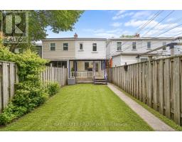 Covered deck with shed and fence - 54 Thyra Avenue Toronto