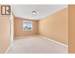 Den - 230 Panamount Grove Nw, Calgary, AB T3K5V5 Photo 14